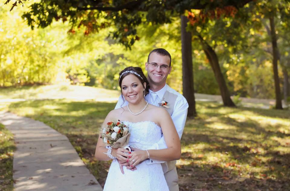 Photo of couple at outdoor fall wedding